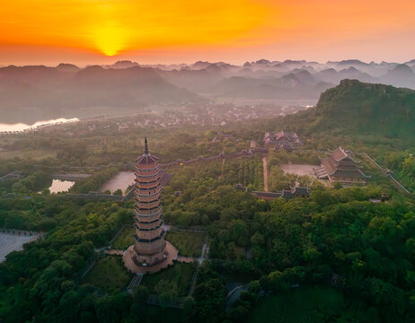 Aerial view of Bai Dinh pagoda and mountains at sunset in Ninh Binh province, Vietnam