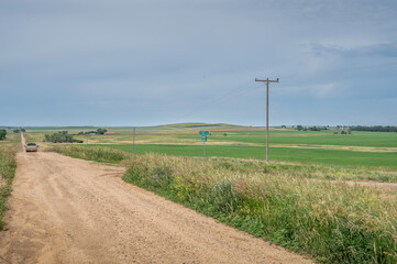 Pickup truck on a rural gravel road near Meadow, South Dakota, USA © jkgabbert