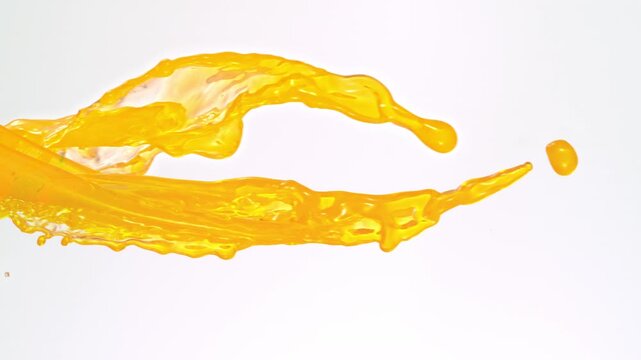 Super Slow Motion Orange Juice Splashes at 1000fps, High-Speed 4K Footage on White Background