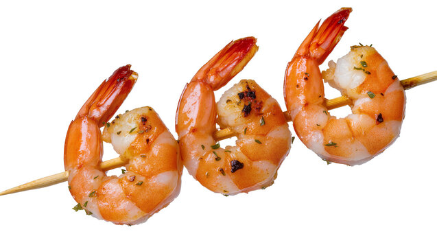 Isolated grilled shrimp skewers seasoned with herbs, delicious cooked seafood appetizer