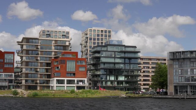 Pan of new apartment buildings located in Amsterdam North on the IJ water side