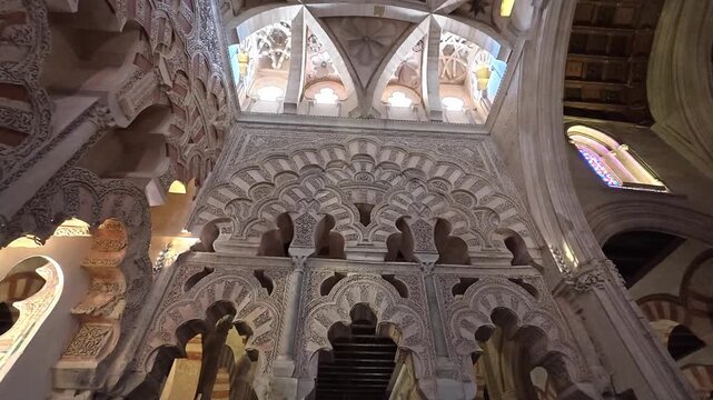 Exploring the intricate arches and mesmerizing patterns of the Great Mosque in Cordoba, Spain