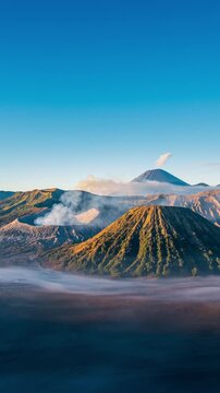Vertical video, Vertical video,Time lapse Landscape of Mount Bromo volcano (Gunung Bromo) during sunrise in Bromo Tengger Semeru National Park, East Java, Indonesia.