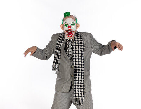 Evil clown businessman isolated on white background