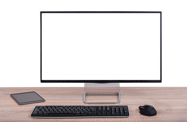 Fototapeta premium A modern computer monitor with a blank white screen sits on a wooden desk alongside a keyboard, mouse, and digital tablet against a white background.