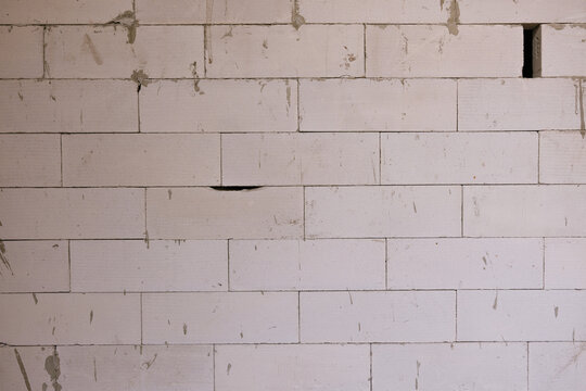 Unfinished wall made of lightweight aerated concrete blocks