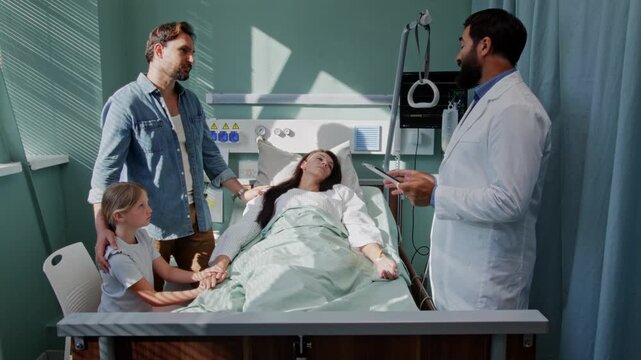 Doctor informs worried family about ill mother condition in ward