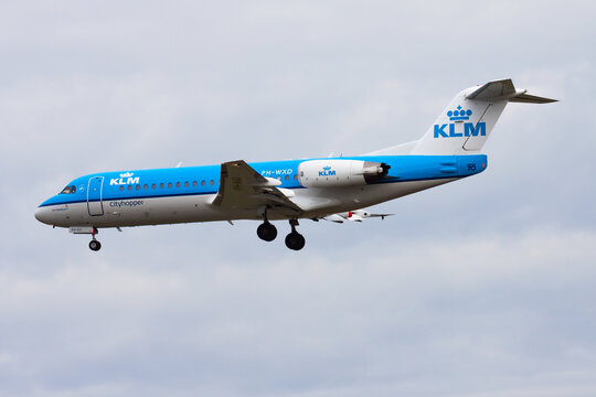 KLM Fokker 70 (PH-WXD) on landing approach at Frankfurt Airport on August 13, 2014 in Frankfurt, Germany