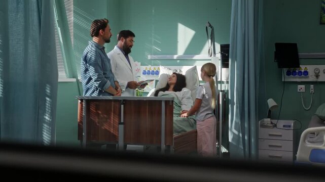 Doctor joins family near patient during mother hospital visit