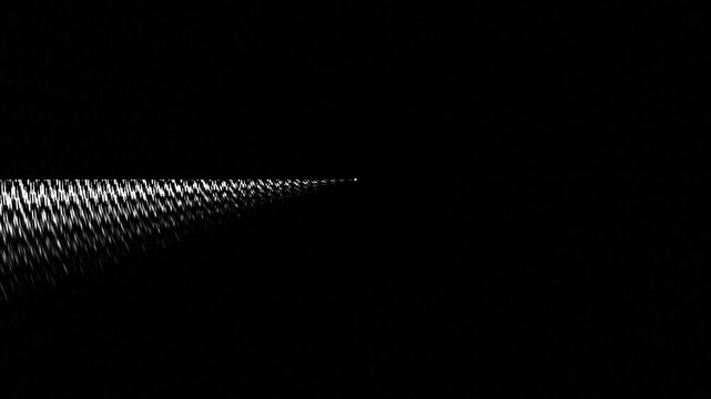 Light beam stretches across dark space creating long shadow