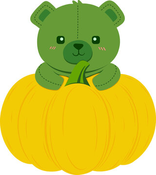 Green Teddy Bear Sitting on Pumpkin