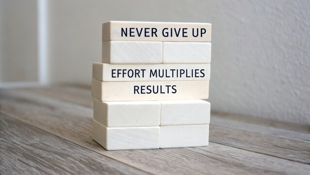 Inspiring Wooden Blocks with Motivational Phrases for Success and Personal Growth on a Background of Light Wooden Surface