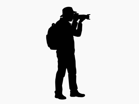Silhouette of a photographer with a backpack, taking a photo with a professional camera, symbolizing the art of photography and visual storytelling.