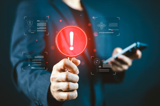 Business professional holding a magnifying glass with a red warning symbol, surrounded by cybersecurity, AI, cloud, and data protection interfaces, representing cyber risk, threat detection.