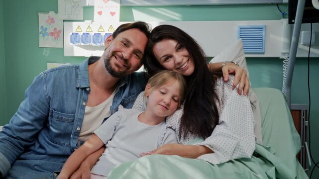 Parents embrace daughter during peaceful hospital recovery