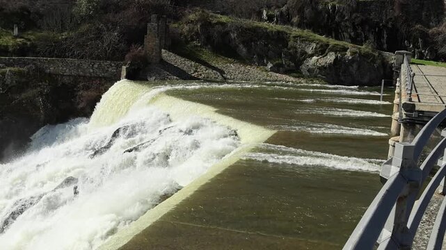 Water release, due to heavy rains, at the El Villar Dam in the province of Madrid, Spain