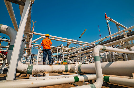 Male worker inspection at valve of visual check record pipeline oil