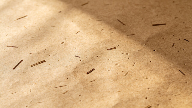Macro texture of raw unbleached natural organic hemp paperboard