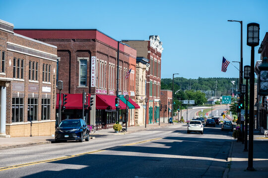 Chippewa Falls, WI, USA - Jul 12, 2026: Sunny historic downtown street on a clear summer afternoon.