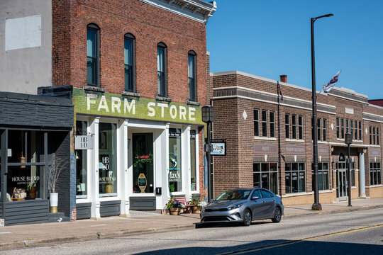 Chippewa Falls, WI, USA - Jul 12, 2026: Historic downtown street view with local shops and restaurants under a clear blue sky. Editorial Use.