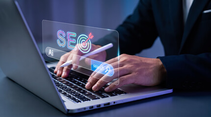 Fototapeta premium Businessman using laptop with digital interface showing seo and ai search concept for digital marketing and business growth strategy