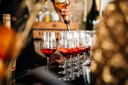 bartender making cocktails at the restaurant bar counter