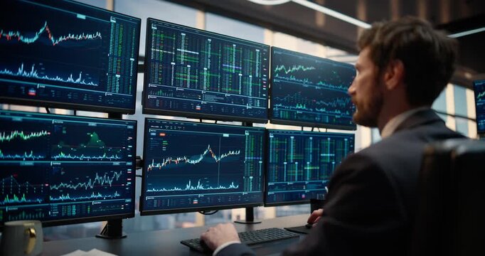 Slow Dolly-in Through a Stock Exchange Asset Management Firm, Where a Stockbroker Ceo Studies Live Charts, Weighing Banking Decisions, Strategy and Capital Growth for Corporate Career Success