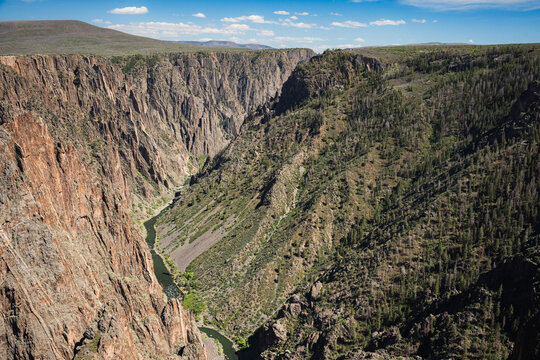 The Gunnison River deep in the valleys of the mountains in Colorado