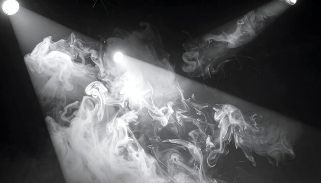 A dramatic black and white scene of swirling smoke illuminated by two spotlights
