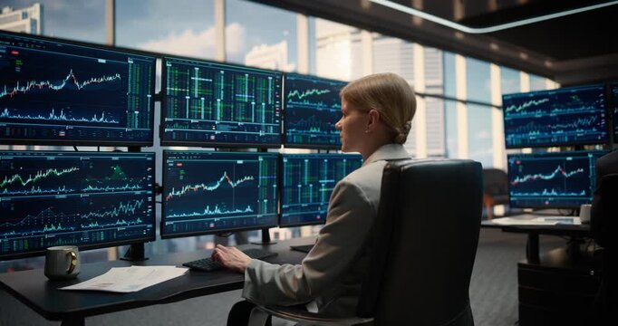 Profile Portrait of Woman Financial Analyst at a Desk Examines Live Stock Exchange Feeds, Candlestick Graphs and Trading Dashboards Across Computer Screens, Equity, Investment and Capital Growth