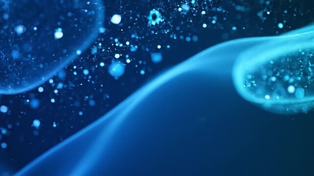 Deep blue microscopic fluid moving organically with soft bokeh particles and clinical space