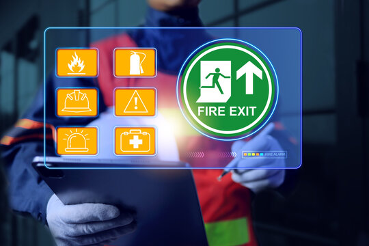 Emergency fire exit concept with safety staff checking basic equipment for first aid and firefighting building or office to complied safety standard requirements