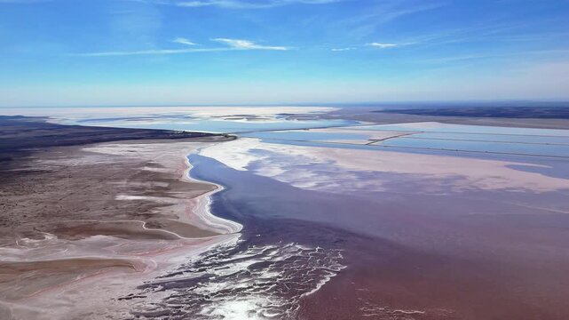 Aerial View of Tropical Beach Coastline with Blue Ocean Water, Sandy Shore, Waves and Scenic Summer Seascape Under Cloudy Sky for Travel and Nature Landscape Background