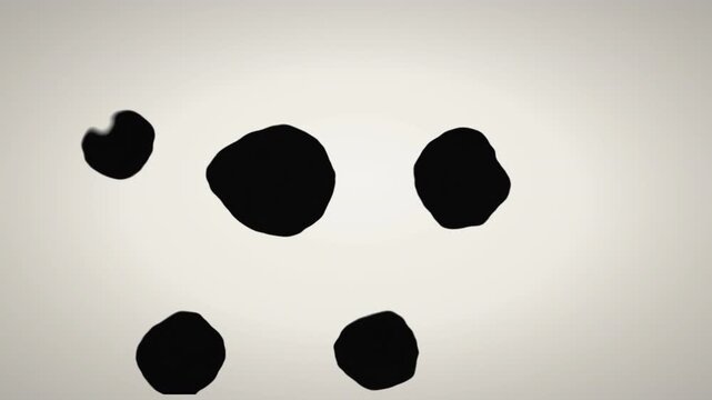 Abstract motion graphics featuring black liquid ink drops floating and merging together against a clean, off-white background.