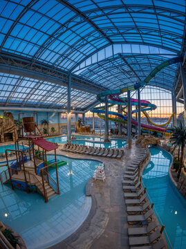Empty Indoor Waterpark Before Opening with Tropical Resort Architecture and Morning Light