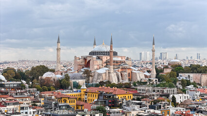 Obraz premium Aerial View of Hagia Sophia Grand Mosque with Istanbul Modern Skyline in Background. 