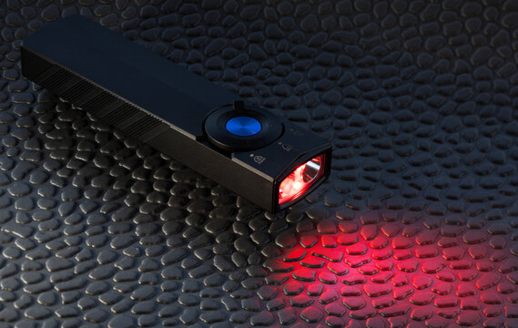 Rectangular flashlight with red LED activated