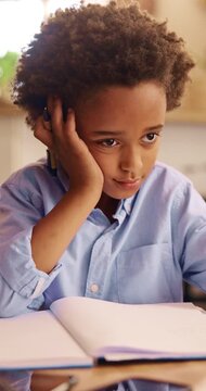 Thinking, education and child with homework in house for learning, development or growth. Notebook, knowledge and boy student with studying for mathematics quiz, assessment or test in apartment.