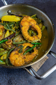 Title
Bengali Style Rui Fish Curry with Seasonal Vegetables Served in Kadai Traditional Indian Rohu Fish Curry Home Style Meal
