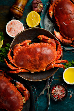 Seafood. Boiled crabs seasoned with lemon, salt and spices. Vertical photo, top view.