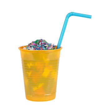 Plastic waste in a disposable plastic cup. Water containing microplastic concept