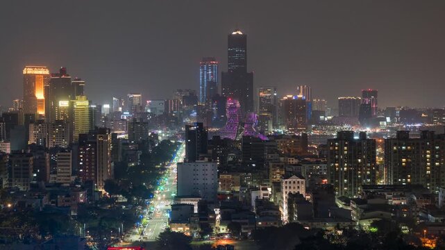 Kaohsiung City timelapse showing its futuristic skyline at night in southern Taiwan, zooming out. 