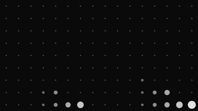 Abstract grid of illuminated circles with varying light intensities on black