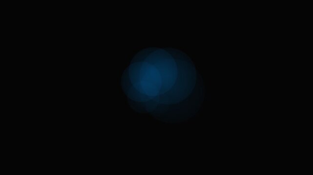 A subtle blue light glow emerging from the shadows in a dark environment