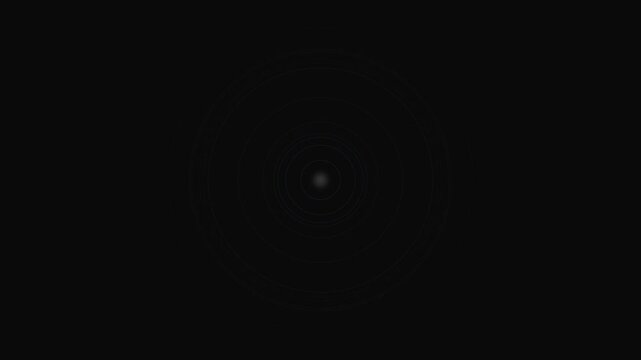 A single faint grey circle isolated against a solid black background field