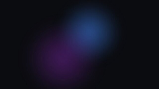 A soft and glowing purple light orb emerging from the deep black background