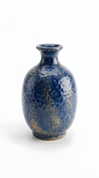 Blue glass perfume bottle with stopper isolated.