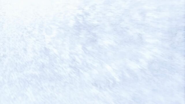 Slow motion shot of a winter snowstorm with snow flying directly toward the camera