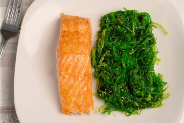 baked salmon  with  seaweed salad © dmiller324