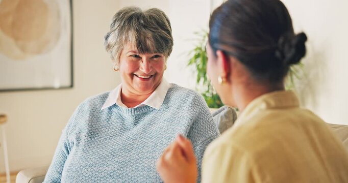 Laughing, senior mother and hug with woman in house, connection and reunion with daughter in lounge. Happy, family and listening to good news, clapping and funny discussion with old person in home